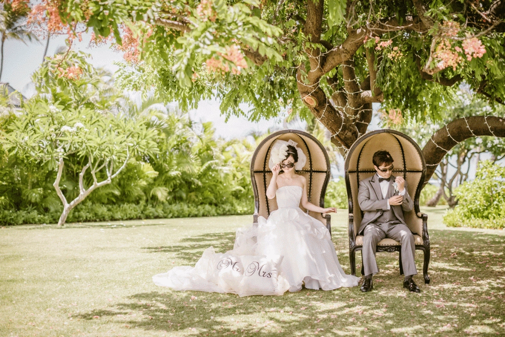 Bride and groom seated outdoors