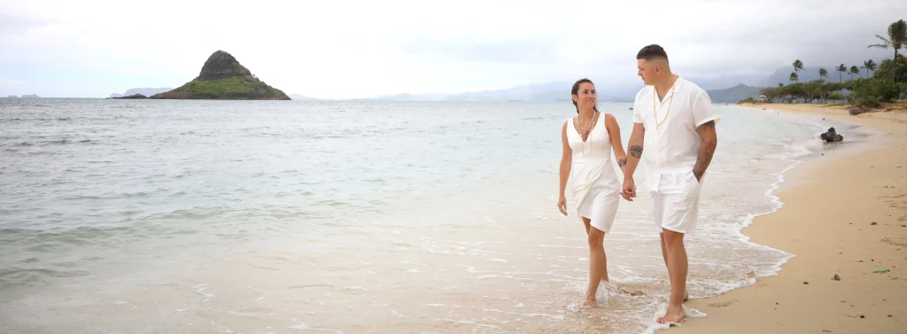 Couple Walking on Kualoa Beach, Hawaii