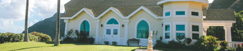 St Catalina Chapel with mountain backdrop