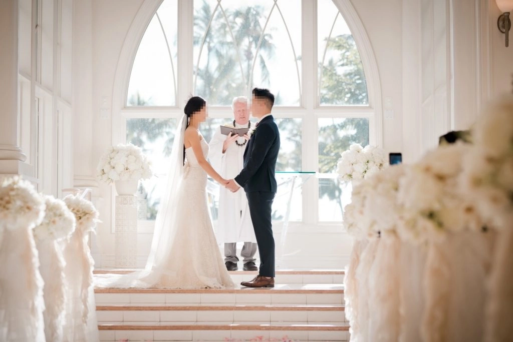 Indoor wedding ceremony with bride and groom