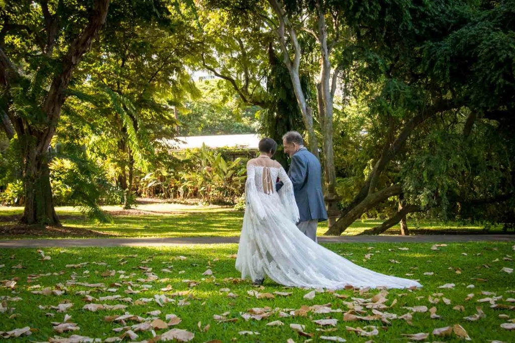 Garden wedding couple walking together